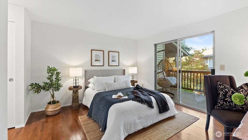 Primary Bedroom on the main floor with sunny deck.