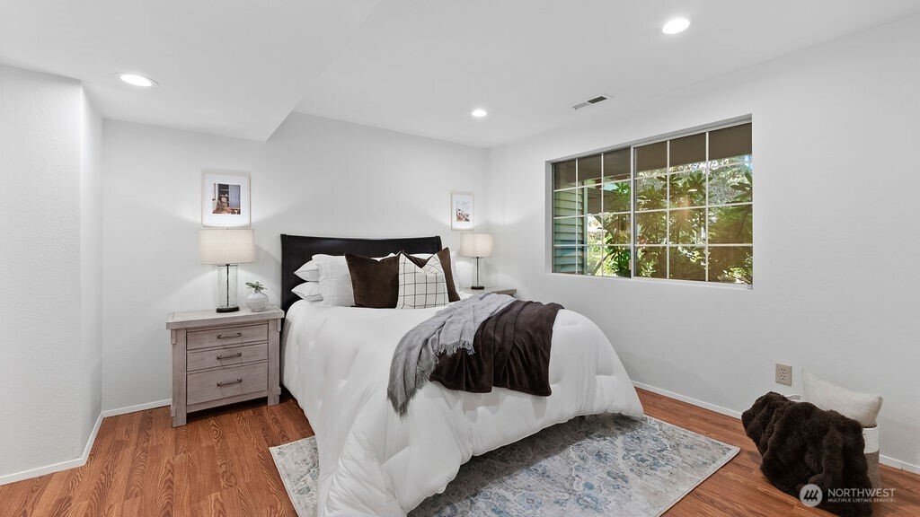 Lower level bedroom with a large close and pass thought the lower level full bathroom to the family room.