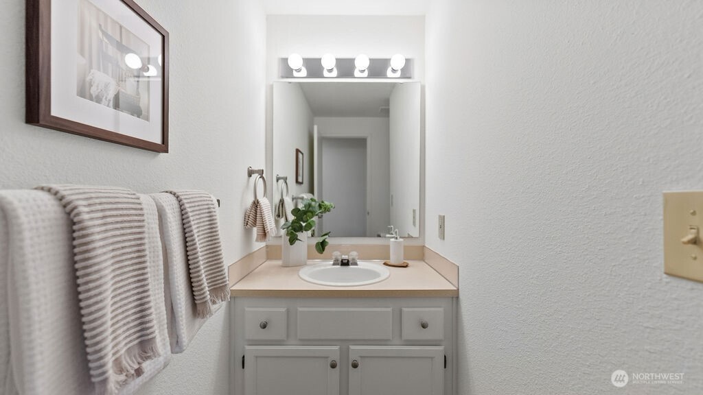 Convenient lower -level bathroom vanity.