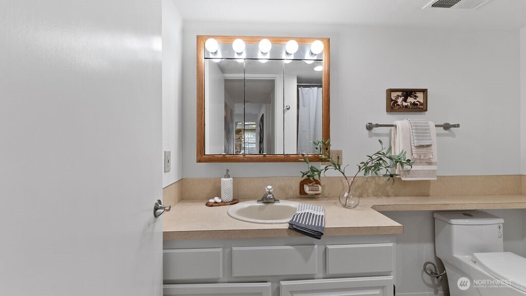 Convenient lower -level bathroom vanity.