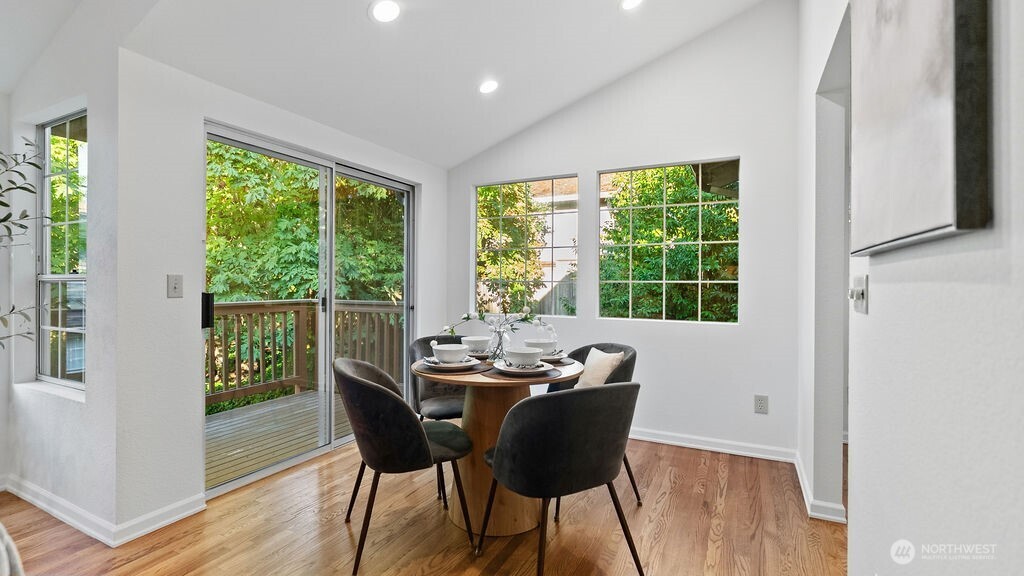 Great for entertaining dining space with vaulted ceilings and access to a priavate delightful entertainment deck.